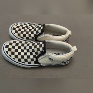 Vans kids slip on sneakers